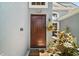 Inviting front entrance with a well-maintained garden and decorative fountain at 2515 Wekiva Walk Way, Apopka, FL 32703