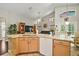 View from the kitchen island overlooking the living room with breakfast nook at 2515 Wekiva Walk Way, Apopka, FL 32703