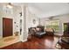 Inviting living room featuring hardwood floors, neutral walls, and comfortable seating at 2515 Wekiva Walk Way, Apopka, FL 32703