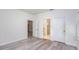 An empty bedroom showing the connection to other rooms in the house at 2808 Sw 139Th St, Ocala, FL 34473