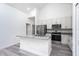 Modern kitchen features granite countertops, stainless steel appliances, and ample cabinet space at 2808 Sw 139Th St, Ocala, FL 34473