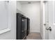 Efficient laundry room with modern washer and dryer at 2808 Sw 139Th St, Ocala, FL 34473