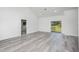 Spacious and bright living area with sliding glass doors to a well-maintained backyard at 2808 Sw 139Th St, Ocala, FL 34473