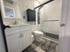Updated bathroom featuring modern fixtures, including a large shower with a multi-spray panel at 2945 Southgate Ter, Orlando, FL 32818
