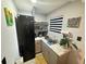Efficient kitchen space with modern appliances and an open layout, designed for easy meal preparation and functionality at 2945 Southgate Ter, Orlando, FL 32818