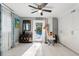 Main bedroom showcases tile flooring, office space, and access to the backyard swimming pool at 2945 Southgate Ter, Orlando, FL 32818