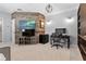 Bedroom with barnwood accent wall, featuring a modern desk and storage system at 306 Balfour Dr, Winter Springs, FL 32708