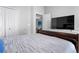 Bedroom featuring a TV and closet at 306 Balfour Dr, Winter Springs, FL 32708