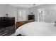 Main bedroom with ample closet space, French doors, and dark wood floors at 306 Balfour Dr, Winter Springs, FL 32708