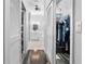 Walk-in closet leads to a bathroom featuring a soaking tub, double sinks and ample storage at 306 Balfour Dr, Winter Springs, FL 32708