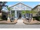 Charming single-Gathering home features a stylish facade with decorative stone accents and well-maintained landscaping at 306 Balfour Dr, Winter Springs, FL 32708