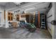 View of an organized two-car garage complete with overhead storage and accessories for sporting goods and outdoor equipment at 306 Balfour Dr, Winter Springs, FL 32708