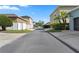 A well-kept neighborhood street features neatly landscaped yards, sidewalks, and curbside recycling bins for each home at 306 Balfour Dr, Winter Springs, FL 32708