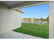 Outdoor patio and backyard with a view of the lake at 307 Monterey St, Kissimmee, FL 34759