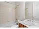 Bathroom featuring a tub shower combo and a single sink at 307 Monterey St, Kissimmee, FL 34759