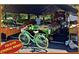 Local farmers market in Solivita, with fresh produce and a bicycle at 307 Monterey St, Kissimmee, FL 34759