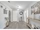 Inviting foyer features modern flooring, neutral colors, and stylish decorative accents at 3150 Sawgrass Ct, Kissimmee, FL 34746