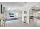 Bright and airy living room showcases modern flooring and an open layout at 3150 Sawgrass Ct, Kissimmee, FL 34746