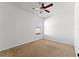 Bright bedroom features a ceiling fan and window with view of the neighborhood at 3281 Pawleys N Loop, St Cloud, FL 34769
