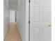 Neutral hallway with tile floors with clean sight lines to other rooms at 3281 Pawleys N Loop, St Cloud, FL 34769