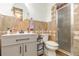 Neutral toned bathroom featuring a white vanity with a solid surface top and a glass enclosed shower at 360 Westchester Dr, Deland, FL 32724
