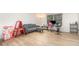 Bright living room with hardwood floors and neutral paint, providing a clean and open space at 360 Westchester Dr, Deland, FL 32724