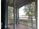 Tranquil balcony overlooking serene lake and nature at 3609 Azurite Ct, Deland, FL 32724