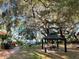 Community gathering area featuring a covered picnic area and lush green space, perfect for social events at 3609 Azurite Ct, Deland, FL 32724