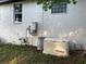 A home exterior featuring a Generac generator system, providing backup power during outages at 3609 Azurite Ct, Deland, FL 32724