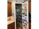 Spacious walk-in pantry with wire shelving for organized storage and convenience at 3609 Azurite Ct, Deland, FL 32724