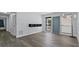 Bright, open living room featuring new floors, modern lighting, and a contemporary design at 451 Hibiscus Rd, Casselberry, FL 32707