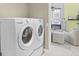Convenient laundry room with modern washer and dryer at 578 Darkwood Ave, Ocoee, FL 34761