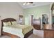 Bright main bedroom features a vaulted ceiling and adjacent bathroom and walk-in closet at 578 Darkwood Ave, Ocoee, FL 34761