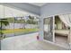 The screened porch features access to the backyard and main bedroom through sliding doors at 578 Darkwood Ave, Ocoee, FL 34761