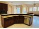 Open kitchen area with granite countertops and stainless steel appliances at 702 Palenci Ct, Winter Springs, FL 32708