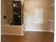 Utility room featuring a Lennox HVAC unit, access panel, and built-in shelves at 702 Palenci Ct, Winter Springs, FL 32708