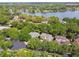 Scenic aerial shot featuring tree-lined neighborhood, providing great privacy at 755 Cranes Court, Maitland, FL 32751