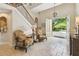 Grand foyer featuring tile flooring, staircase, and an abundance of natural light at 755 Cranes Court, Maitland, FL 32751