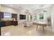 Spacious living room with tile floors, stylish decor, bar, and a pool table at 755 Cranes Court, Maitland, FL 32751