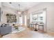 Open living room featuring high ceilings, stylish furniture, and natural light at 755 Cranes Court, Maitland, FL 32751