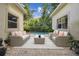 Inviting outdoor patio area featuring brick pavers and comfortable seating, perfect for relaxing at 755 Cranes Court, Maitland, FL 32751
