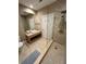 Modern bathroom features walk-in shower and sleek vanity with contemporary fixtures, providing a spa-like retreat at 7567 Brooklyn Dr, Kissimmee, FL 34747