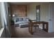 Cozy bedroom space with seating area, desk, and map wall decor at 7567 Brooklyn Dr, Kissimmee, FL 34747