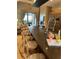 Gourmet kitchen boasting a large island, modern appliances, and backyard view at 7567 Brooklyn Dr, Kissimmee, FL 34747
