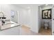 Clean and bright bathroom featuring a granite vanity, walk-in shower, and separate toilet area at 786 Mocking Jay Ln, St Cloud, FL 34771