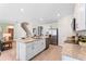 Well-appointed kitchen featuring granite countertops, stainless steel appliances, and ample cabinetry at 786 Mocking Jay Ln, St Cloud, FL 34771