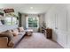 A cozy living room showcases a comfortable sofa, natural light, and stylish decor, creating an inviting space at 786 Mocking Jay Ln, St Cloud, FL 34771