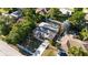 Aerial view of a single-story home featuring a screened-in pool and a two-car garage at 814 Vercelli St, Deltona, FL 32725