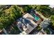 An aerial view of a screened in pool and fenced backyard at 814 Vercelli St, Deltona, FL 32725