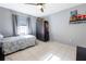 Cozy bedroom with stylish decor, window, storage, and tile floors at 814 Vercelli St, Deltona, FL 32725